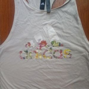 Cream Adidas workout tank with floral letters.
